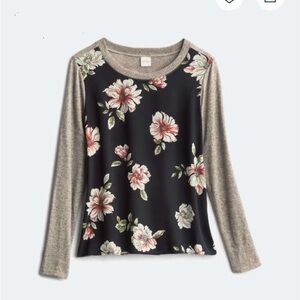 Women’s blouse with beautiful floral detail.